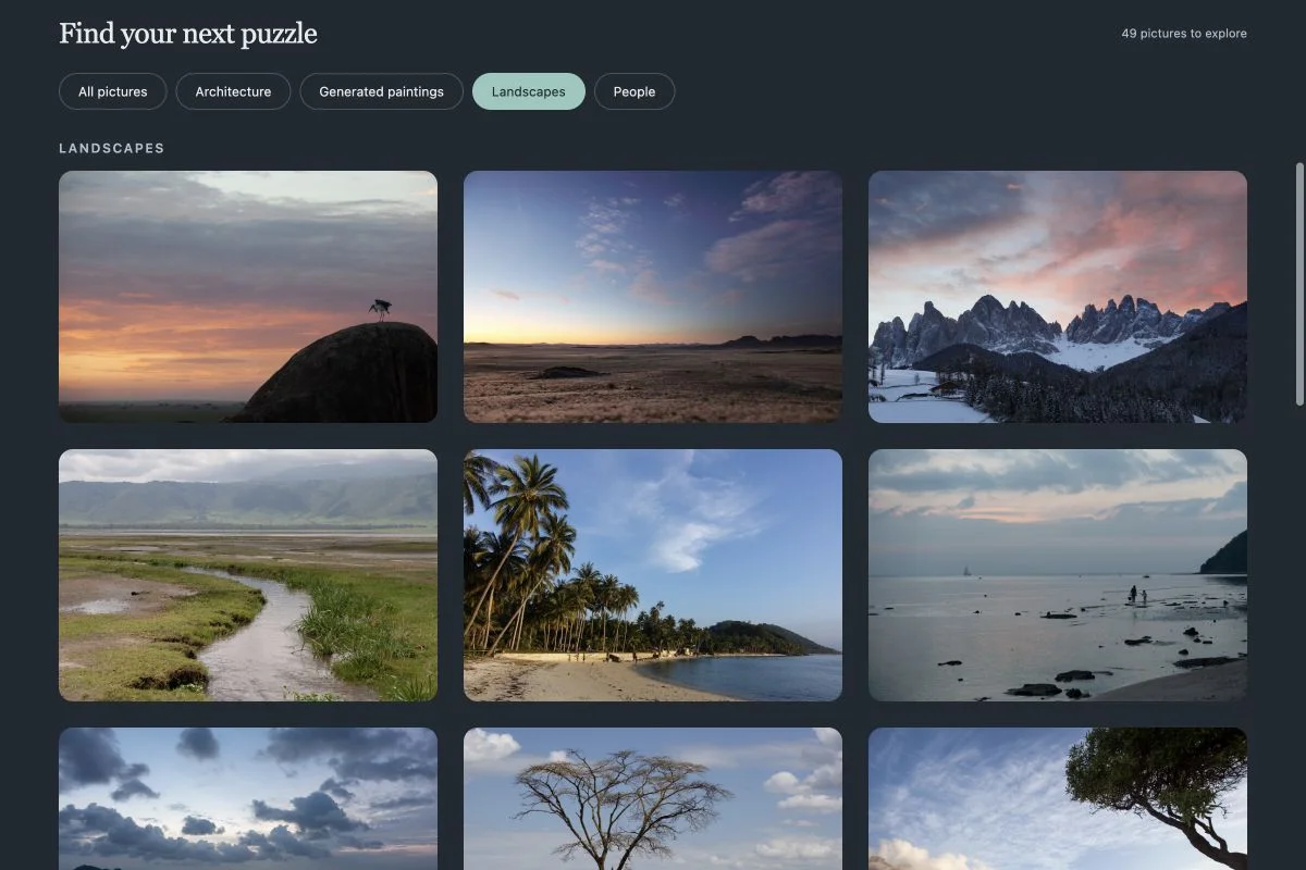 The Jigsaw Puzzles landscape gallery, with mountains, beaches, and other photographs in the Midnight theme.